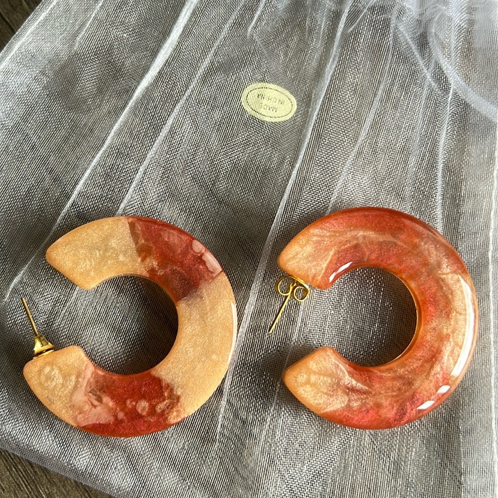 Orange hoop earrings